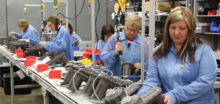 assembly line workers doing electro-mechanical assembly